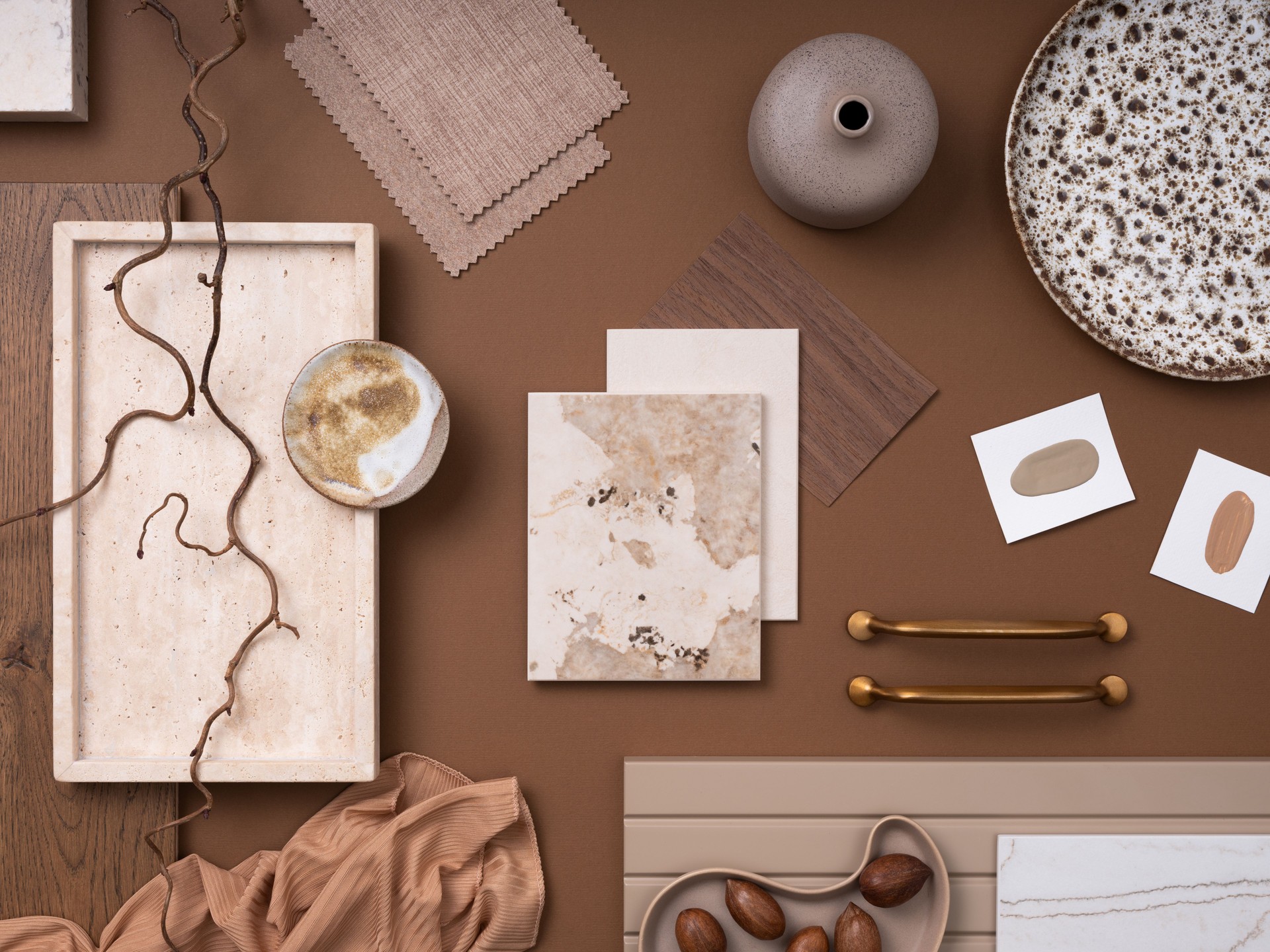 Elegant  flat lay composition in brown and beige color palette with textile and paint samples, lamella panels and tiles. Architect and interior designer moodboard. Top view. Copy space.
